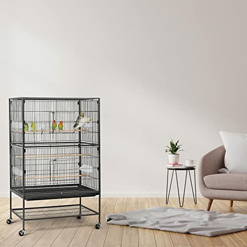 Large bird cage with birds in a modern living room.